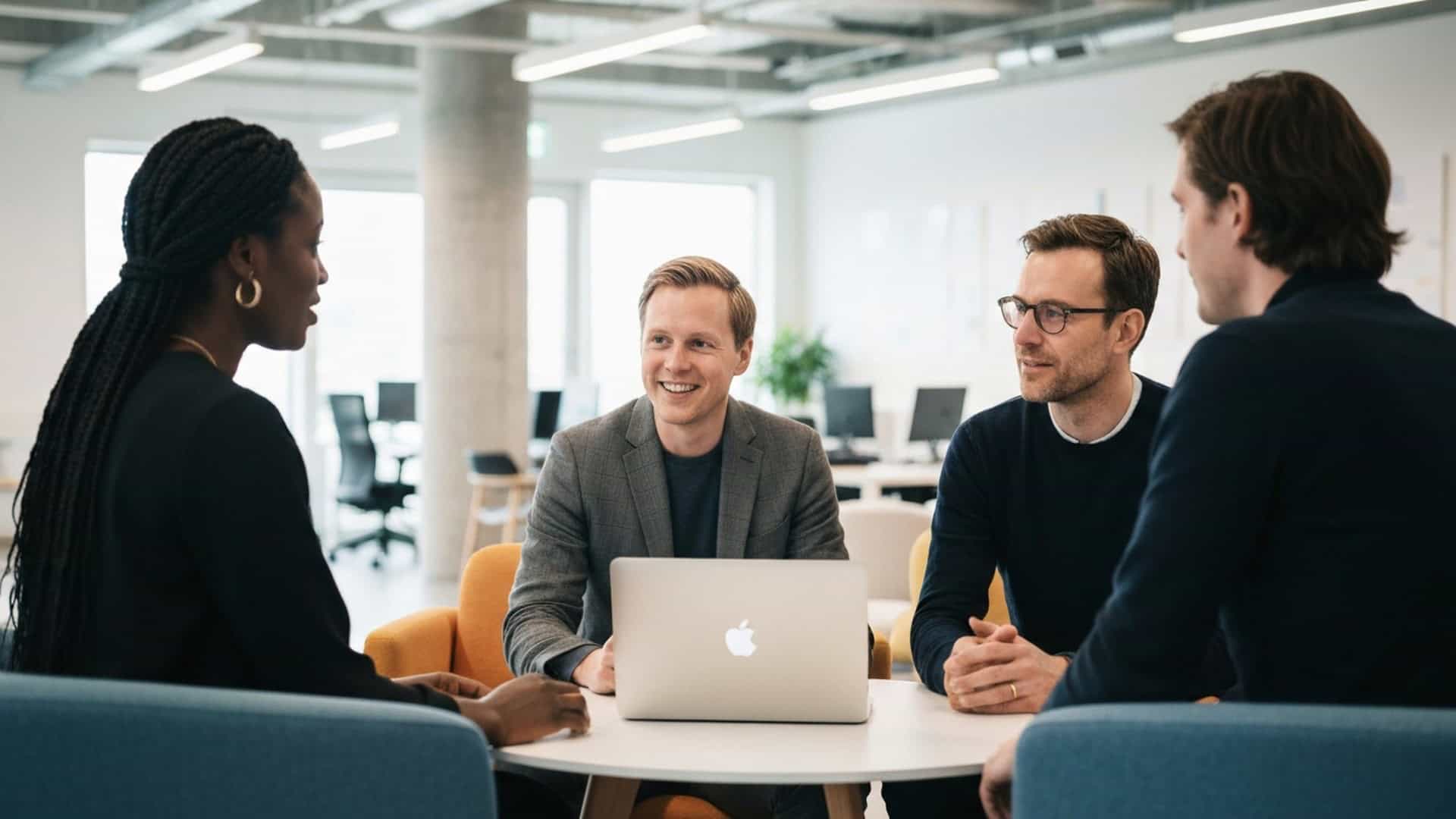 Diverse team measuring employee engagement in a modern workplace